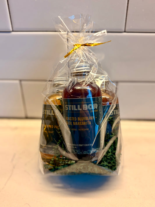 Gift bag with single-serving bottles of The Still Bar's cocktails