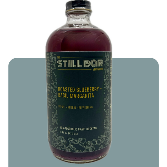 Bottle of Roasted Blueberry + Basil Margarita from The Still Bar on a white background